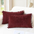 CaliTime Christmas Throw Pillow Covers Decorative 20 X 12 Inches Pack of 2 Cozy Solid Dyed Soft Chenille Cushion Cases with Pom Poms for Couch Sofa Bed Living Room Home Burgundy